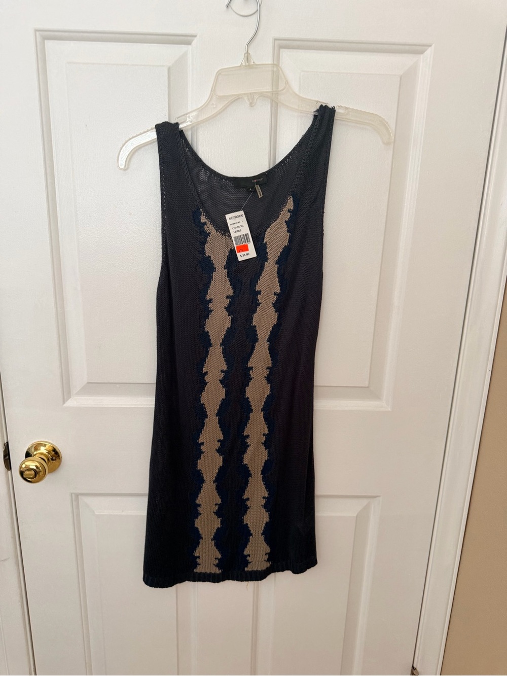 Posh Black Sleeveless Mini Dress with Tan Chevron Panel